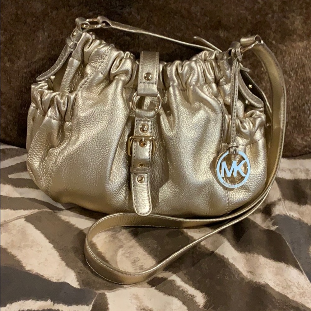 Michael Kors metallic gold crossbody bag.  💯Auth